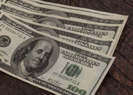 Mercado reage a dados dos EUA e d&oacute;lar comercial cai a R$ 5,22